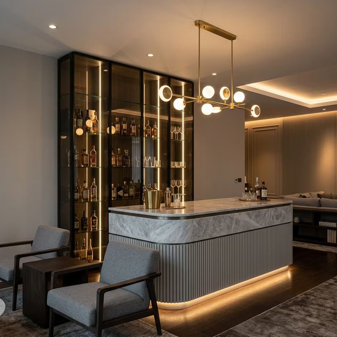 Modern Home Bar Design featuring Full-height LED Glass Cabinet with Waterfall Island