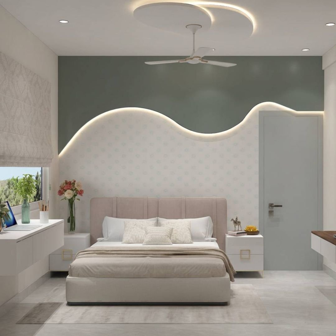 Contemporary Green Curved Wall Design with Cove Lighting and Flush Door